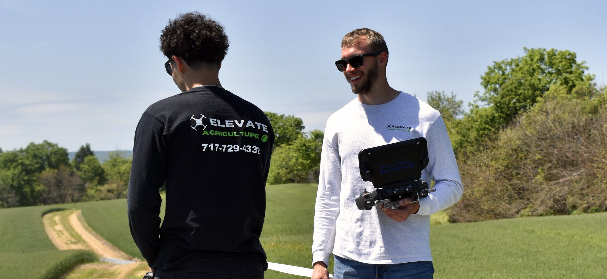 Two of the owners on the launch pad, controller in hand